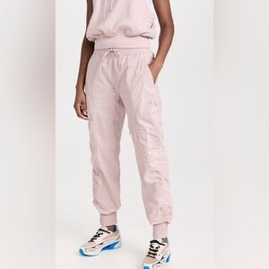 Adidas by Stella McCartney TrueCasuals Woven Pants in the color New Rose